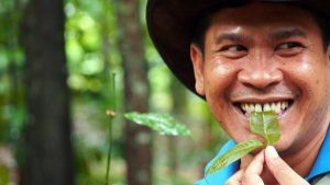 Cheardsak Kuraksa, an agroforestry researcher at Thaksin University in Thailand, enjoying his research into the multiple benefits of trees on farms. Photo: World Agroforestry Centre/Robert Finlayson