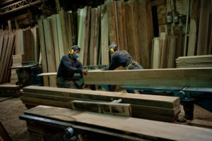   Workers in a timber yard that sells wood from the Amazon, Quito, Ecuador. Timber is one of the commodities that FTA researchers focus on. Photo: Thomas Munita/CIFOR 